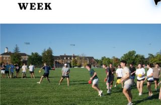 Students participating in an outdoor Greek Week event